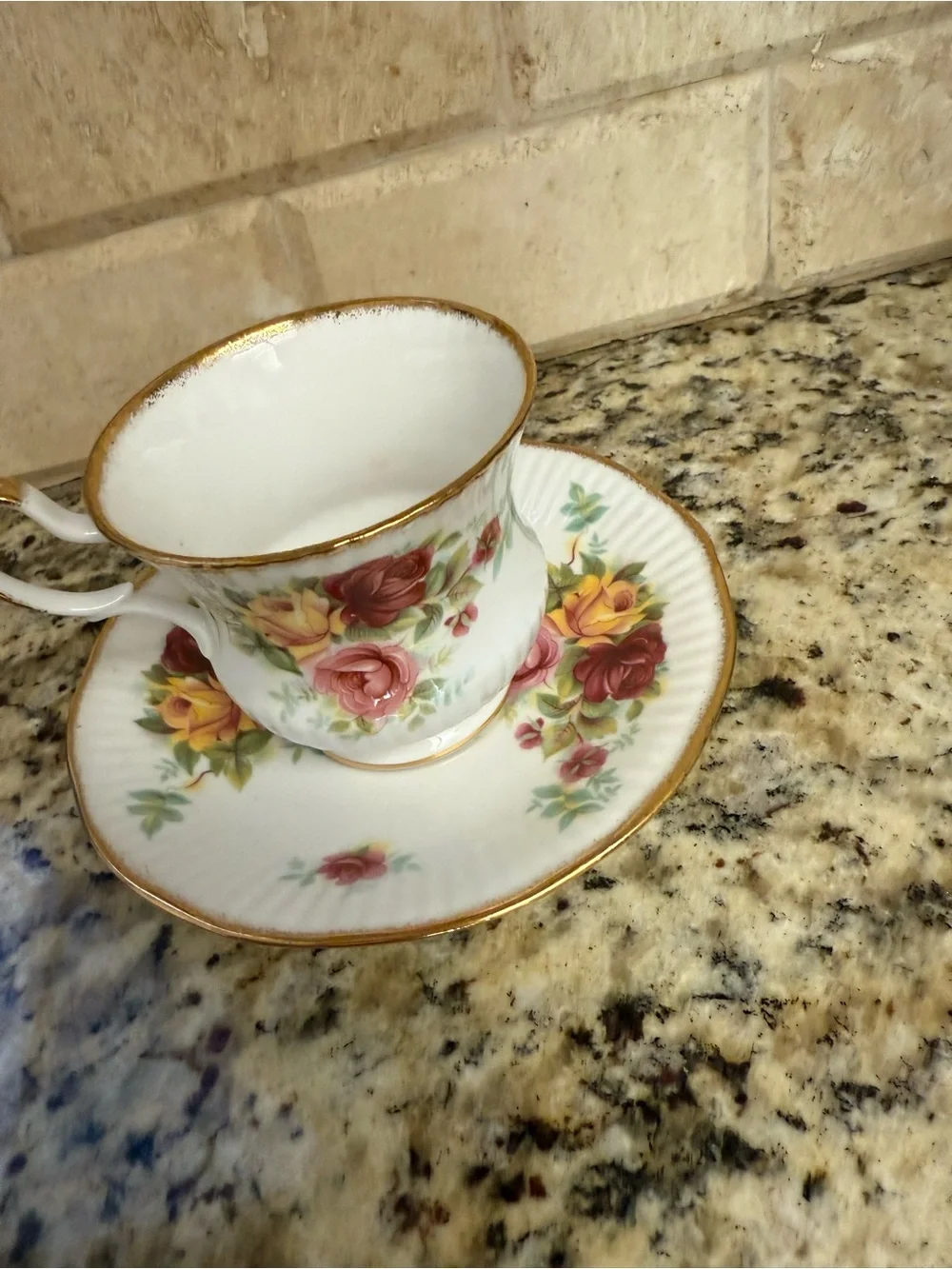 Porcelain Teacup and Saucer Set with Pink and Yellow Rose Pattern